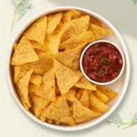 Salsa & Chips · Warm up with toasty tortilla chips served with a side of tangy salsa.