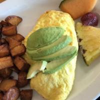 DUNGENESS CRAB OMELET · DUNGENESS CRAB , avocado, onions and Cheddar cheese.
