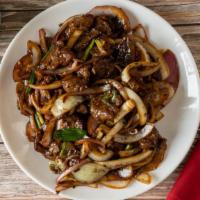 Mongolian Beef · Sliced tender beef seared with onions, scallions in special Mongolian sauce.