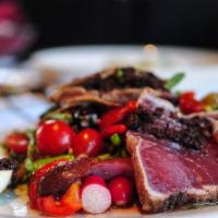Niçoise Salade · seared Ahi, green beans, tomatoes, fingerling potatoes, tapenade, anchovy, roasted red bell ...