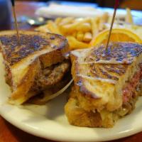Patty Melt · 1/3 pound beef patty, grilled onions, swiss cheese, and thousand island on sourdough bread.