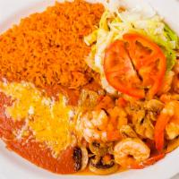 Camarones al Mojo de Ajo · Prawns and mushrooms sautéed in butter, garlic, onions, and spices. Served with lettuce, gua...