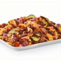 New! Smothered Bbq Brisket Chips · Yukon Chips topped with beer cheese sauce, chopped smoked brisket, hardwood-smoked bacon, di...