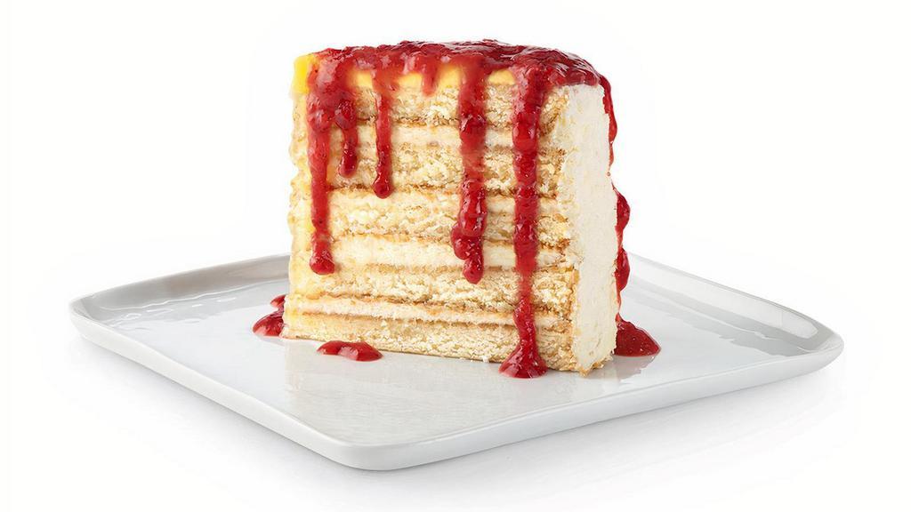 New! Freckled Lemonade® Cake · Light and refreshing lemon cake layered with lemon mousse and white chocolate bits, topped with lemon curd and strawberry purée. Limited time while supplies last.