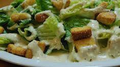 Caesar Salad · Romaine lettuce, parmesan cheese, and garlic croutons.