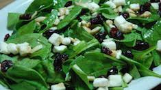 Spinach Salad · Baby spinach, goat cheese, walnut, dried cranberries, and balsamic dressing.
