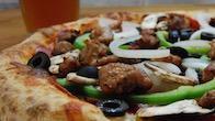 The Works Pizza · Canadian bacon, pepperoni, salami, Italian sausage, onions, mushrooms, bell peppers, and bla...