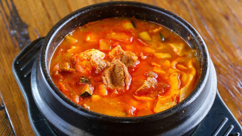 Soybean Tofu Soup 된장 순두부 · Soft tofu with soybean paste (combination with assorted seafood).