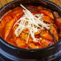 Mushroom Tofu Soup 버섯 순두부 · Soft tofu stew with beef, shiitake mushroom, and enoki mushroom.