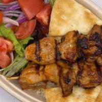 Chicken Thigh Plate · Specially marinated chicken thigh and salad, served with Rice or Roasted Veggies, choice of ...