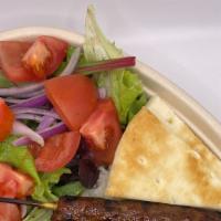 Adana Kebab · With its' traditional spices Adana Kebab made from ground beef served over Rice or Salad or ...