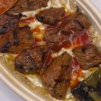 Roasted Eggplant Kebab · Choice of meat and yogurt, tomato sauce, grilled bell pepper and tomato