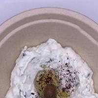 Cacik · Great combination of yogurt and cucumber Served with Pita Bread