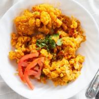 Aloo Gobi · Potatoes cooked with cauliflower and spices.