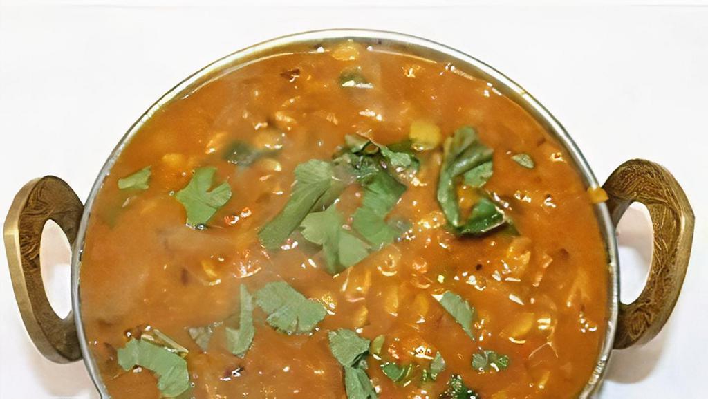 Dal Tadka · Yellow lentil cooked in a blend of spices.