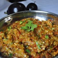 Bengan Bharta · Mashed eggplant cooked in a blend of spices.