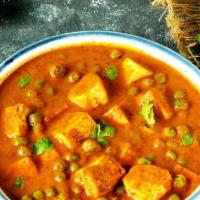 Mutter Paneer · Cheese cubes cooked with green peas and spices.
