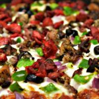 Combo Pizza · Pepperoni, ground lamb, mushrooms, bell pepper, onions, olives & tomatoes.