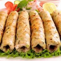 Chicken Seekh Kabab · 2 pieces.Ground chicken marinated and cooked in a clay oven on skewers.