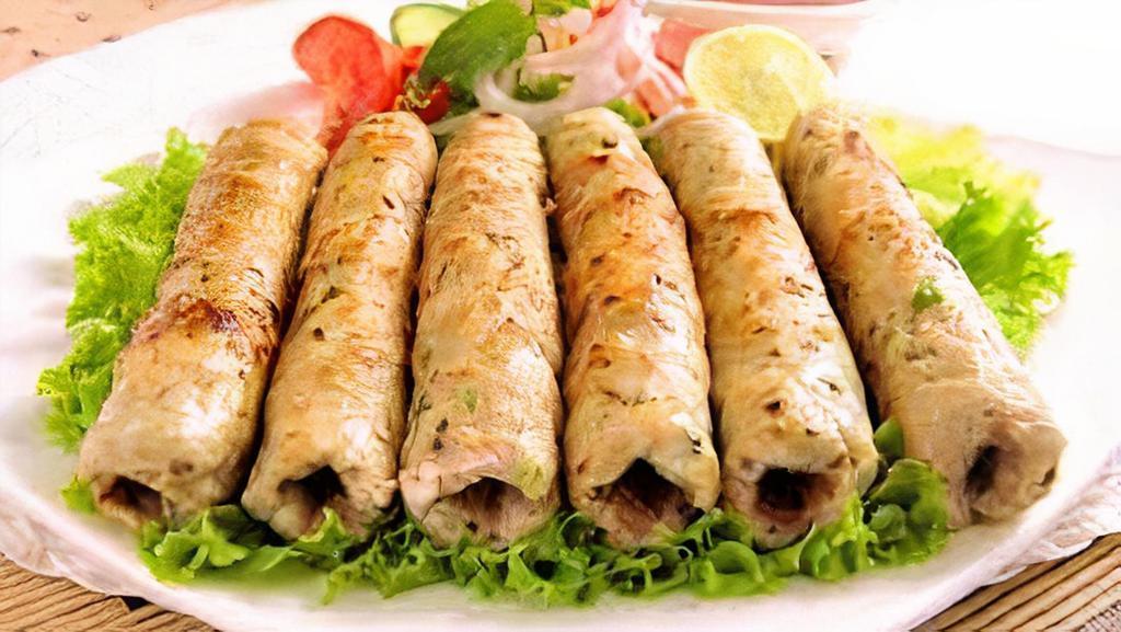 Chicken Seekh Kabab · 2 pieces.Ground chicken marinated and cooked in a clay oven on skewers.