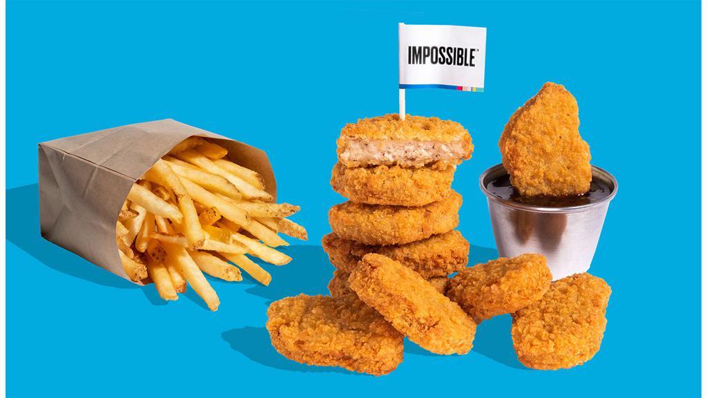 Sticky Sesame Impossible™ Nuggets + Fries · The chicken crossed the road just to get these 10 Impossible™ Chicken Nuggets Made From Plants with Sticky Sesame sauce over fries. No chickens were harmed in the making of this must-have dish! Sauce is on the side so you can smother it or dunk it with sauce - it’s your destiny!