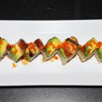 Dragon Roll · Shrimp tempura and imitation crab meat. Top: unagi, avocado and masago.