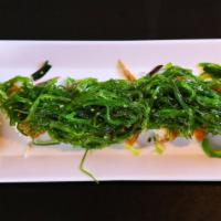 Vegi King Roll · Deep-fried tofu, kobo, inari, and seaweed salad.
