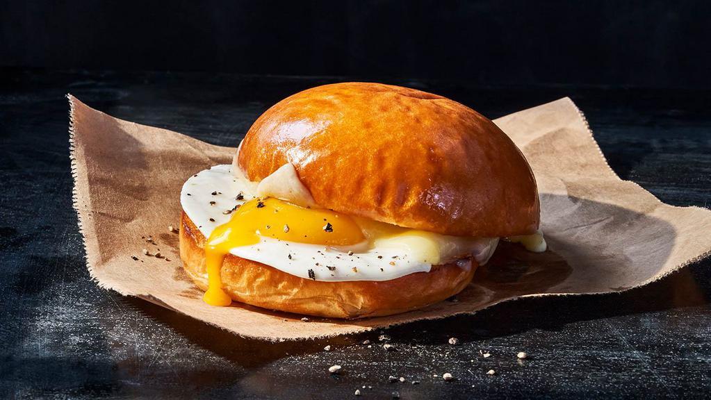 Egg & Cheese On Brioche · 380 Cal. Over easy egg, aged white cheddar, salt and pepper on Brioche. Allergens: Contains Wheat, Milk, Egg