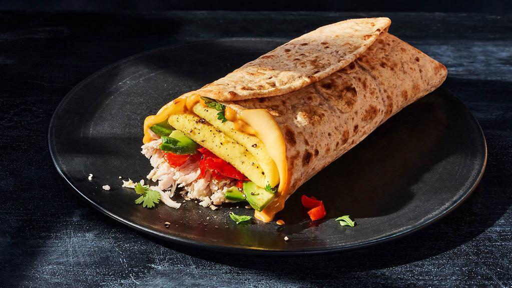 Chipotle Chicken, Scrambled Egg & Avocado Wrap · 470 Cal. Smoked, pulled chicken raised without antibiotics, scrambled egg, smoked Gouda cheese, chipotle aioli, zesty sweet Peppadew™ peppers, fresh avocado and cilantro, salt and pepper in a Whole Grain Wrap. Allergens: Contains Wheat, Soy, Milk, Egg