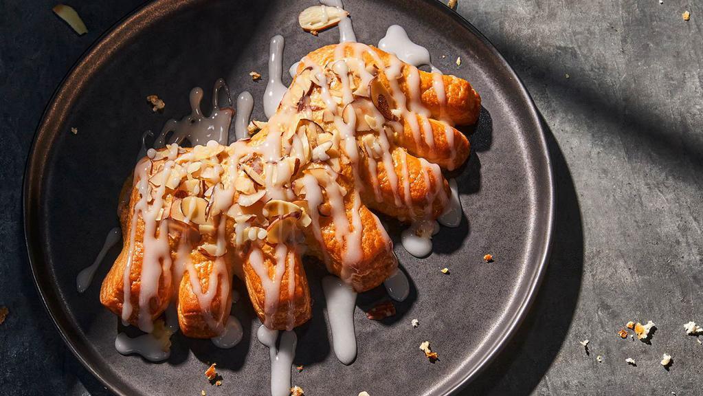 Bear Claw · 500 Cal. Freshly baked pastry made with an almond filling and drizzled with icing and sliced almonds. Allergens: Contains Wheat, Soy, Milk, Egg, Tree Nuts