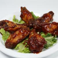 Hot Wings (Large) · Small is 6 pieces, large is 12 pieces, family is 25 pieces.