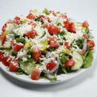Greek Salad (Large) · Green leaves, feta cheese, tomato, red onion, pepperoncini, cucumber.