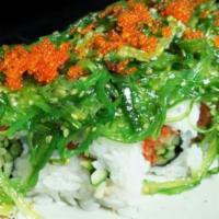 Poki Roll · Spicy tuna, cucumber / seaweed salad, tobiko.