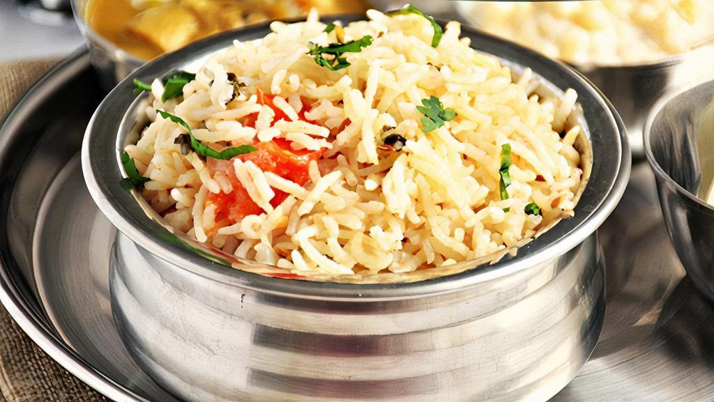 Plain Biryani · Plain biryani(Kuska Rice) cooked in onion-tomato base (without any vegetables or meat) and flavored with spice powders, mint and cilantro leaves.