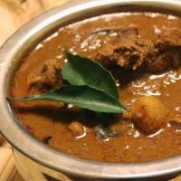 Chicken Varutharachatu · MalabarCoast masterpiece ! Chicken curry  flavored with roasted coconut and spices. This rec...