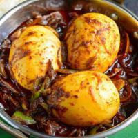 Egg Roast · Egg cooked with whole spices. Onion & Tomato based