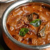 Beef Curry · Tender beef cooked with mild spices and coconut.