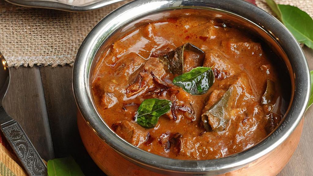 Beef Curry · Tender beef cooked with mild spices and coconut.