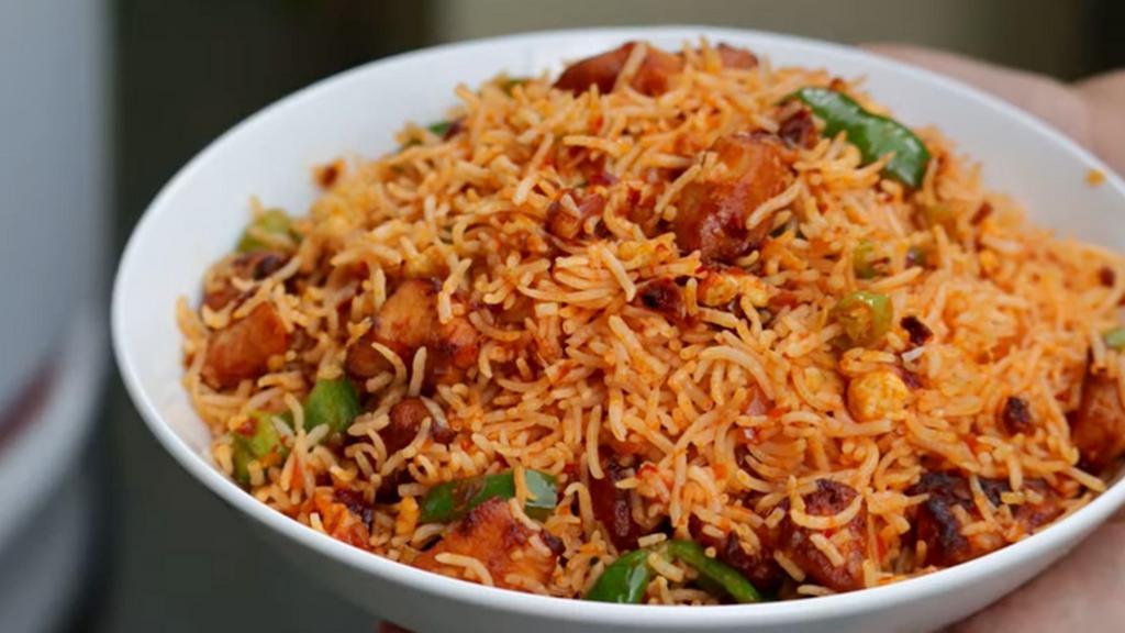 Schezwan Fried Rice - Chicken · Schezwan Fried Rice is a vibrant, spicy, tasty and popular Indo Chinese recipe of stir-fried vegetables and rice with schezwan sauce.