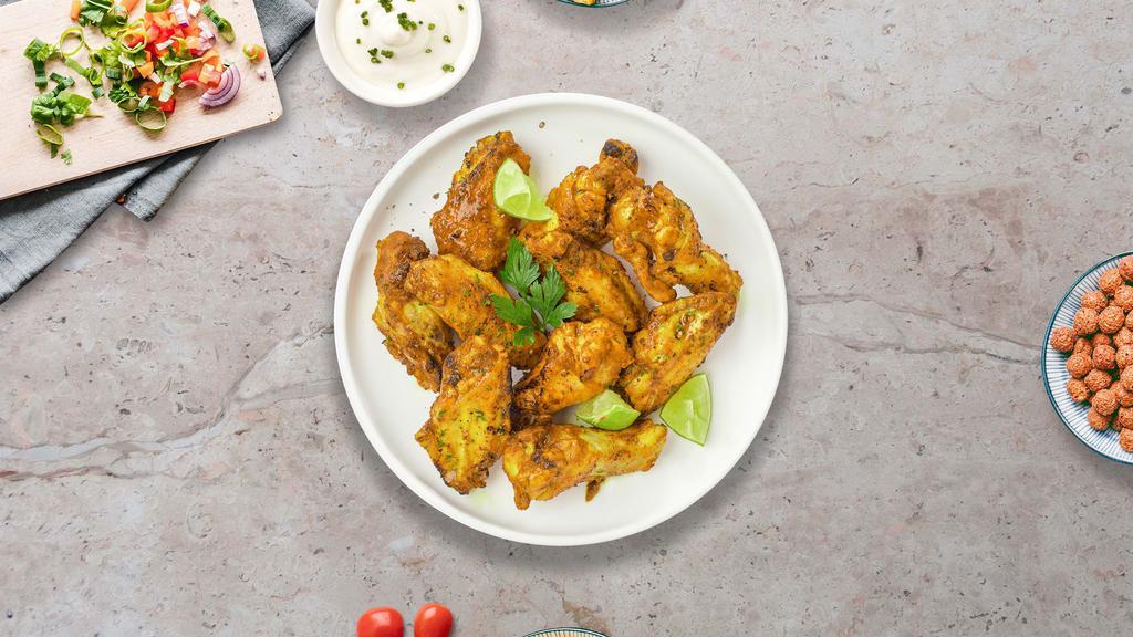 Lemon Pepper Wings · Fresh chicken wings, fried until golden brown, and tossed in lemon pepper sauce. Served with a side of ranch or bleu cheese.