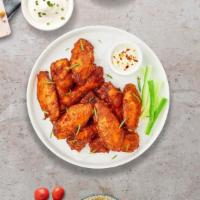 Chicken Wings · Fresh chicken wings fried until golden brown. Served with a side of ranch or bleu cheese.