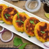 Vegan Aloo Tikki · Mashed potato patty with fresh organic veggies, and finely diced onion tomatoes. Gluten-Free.