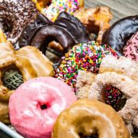 Mixed Dozen Regular Donuts · Assorted donuts raised, cakes, and old fashioned. No specialty donuts. We just mix a variety...