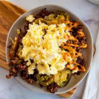 Plant Meat Spicy Hash · Plant Meat scrambled with fresh hash browns, jalapeños and topped with shredded cheddar, two...