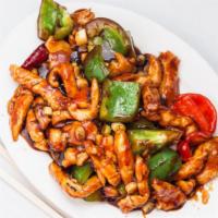 General Tso's Chicken · Spicy. Strips of boneless chicken breast marinated and sautéed with bell peppers and dried c...