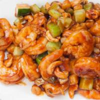 Cashew Prawns · Prawns quick sauteed with bits of celery and zucchini and cashew nuts in a tangy brown sauce.