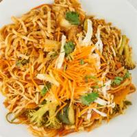 Pad Thai · Stir fried rice noodle with house seasoning, tofu, bean sprouts, onion, carrots, ground pean...