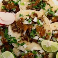 Regular Taco · Choice of Meat, Cilantro, Onion, Salsa