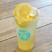 Lemon Bomb Green Tea · Squeezed Lemon with Green Tea and topped off with lemon slices.