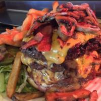 We Dare-You-To-Try Burger · It's a TRIPLE hamburger patty, bacon, jalapenos, mushroom, grilled  onions and cheese...YOU ...
